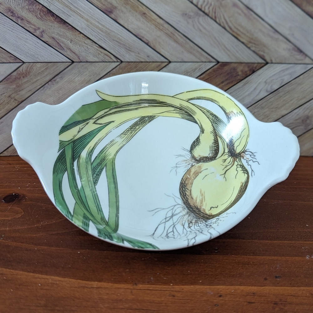 Small gratin style porcelain dish with green onion design.